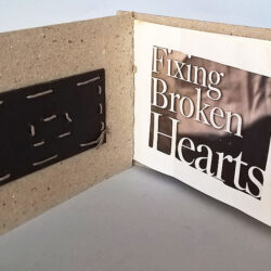 Broken Hearts, (inside) 2014, 5 x 12.5 x 7", board, cloth, paper, lace, zipper, paper, linen thread