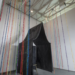 Sanctuary: Know Safe Space, 2025, 13' x 12' x 12' canvas, netting, burlap, cord, lace, ribbon, paint, wood, varnish